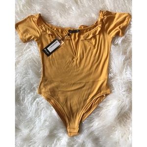 Mustard yellow onesy🌼